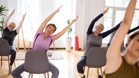 5 Minute Chair Yoga Stretch for Beginners: a quick and easy stretch routine to follow along from the comfort of your chair!💙Get your FREE Blissful Morning G...
